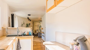 A modern kitchen with wooden countertops, a built-in oven, and a coffee machine. - ★ T2 Cathedral & Torre Ventosa ★ Centre ★ Clim ★ Wifi ★ Parking on request (Béziers)
