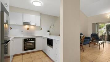 Coffee/tea maker, fridge, microwave, oven