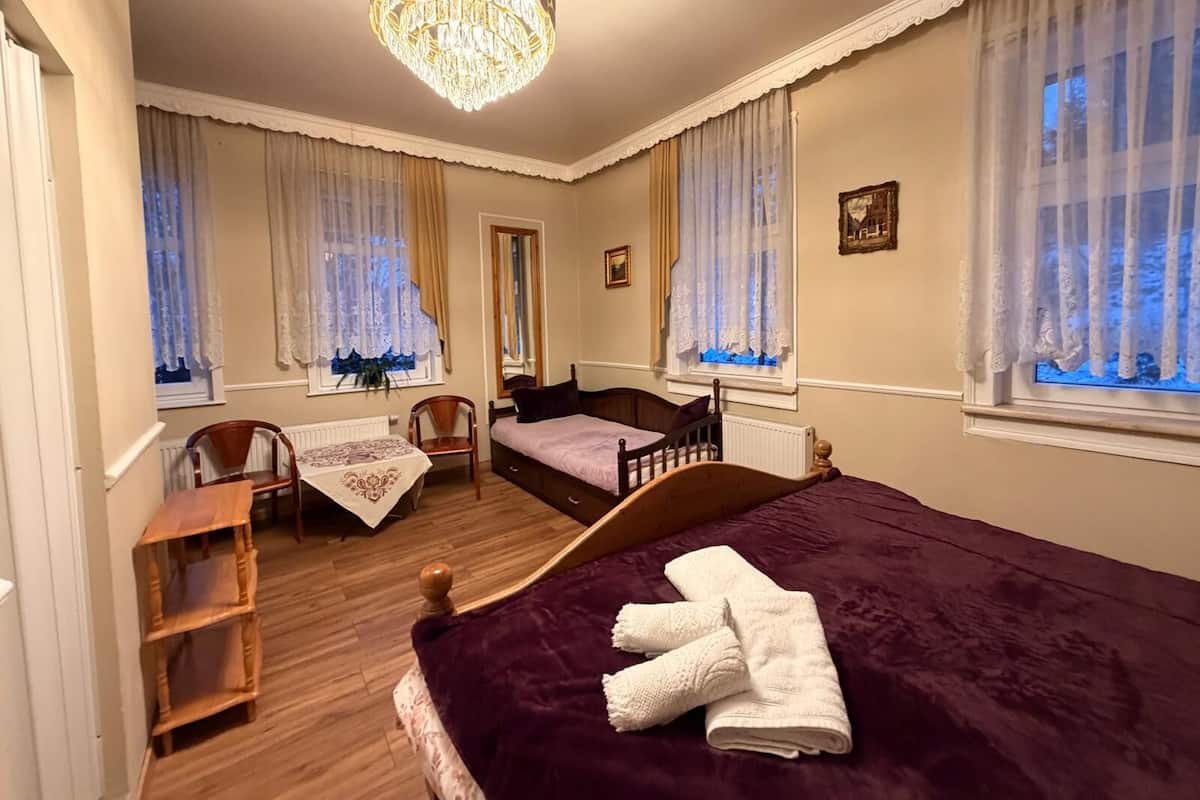 Superior Quadruple Room, Hill View | Hypo-allergenic bedding available, Tempur-Pedic beds, laptop workspace