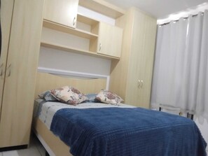 Apartamento família, varanda coberta, vista para a piscina | 1 quarto, Wi-Fi de cortesia
