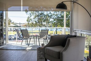 Two Bedroom Townhouse - No Pets Allowed | Living area | Flat-screen TV - Lazy Days by Stay Noosa (Noosaville)
