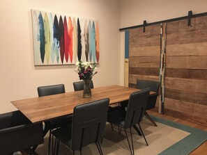 Enjoy meals in this stylish dining area with a large table and comfortable seating for six.