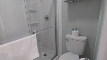Shower, towels, soap, shampoo