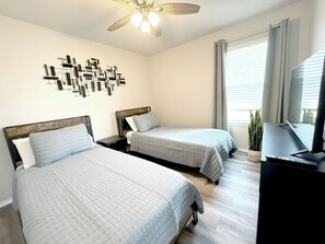 4 bedrooms, desk, iron/ironing board, travel cot