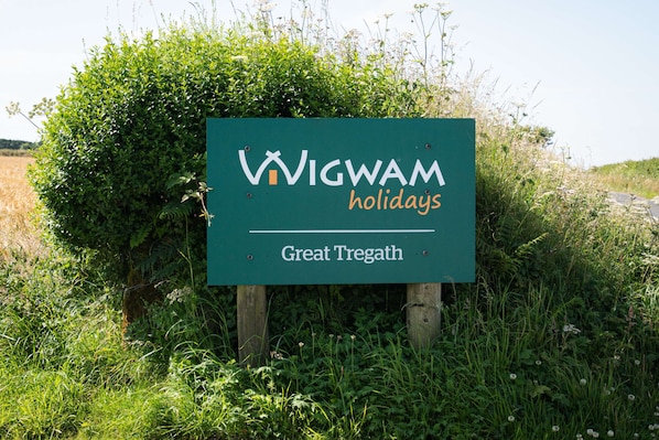 A sign for Wigwam Holidays in Great Tregath.