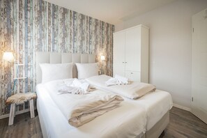 3 slaapkamers, een bureau, een strijkplank/strijkijzer, wifi