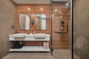 Deluxe Apartment, Balcony, Ocean View | Bathroom | Shower, hydromassage showerhead, free toiletries, hair dryer - Luxury Hillside Apartment Phu Quoc (Phu Quoc)