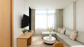 Premium bedding, in-room safe, blackout curtains, soundproofing