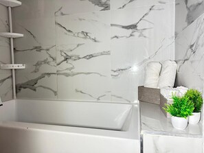 Hair dryer, towels, soap, shampoo