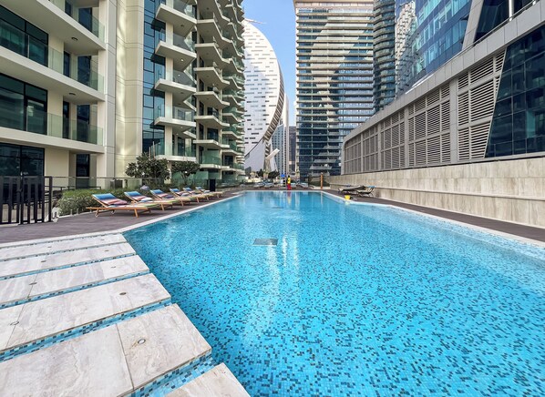 3 outdoor pools, pool umbrellas, pool loungers