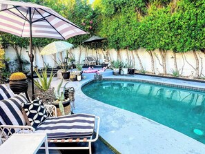 Outdoor pool, a heated pool - The Twin Palms Art House, your vibrant midcentury modern Palm Springs home base (Palm Springs)