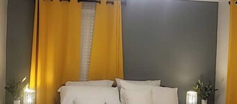 Private upper level 3-bedroom oasis with AC and WiFi. (Host occupies basement)