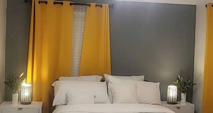 Private upper level 3-bedroom oasis with AC and WiFi. (Host occupies basement)