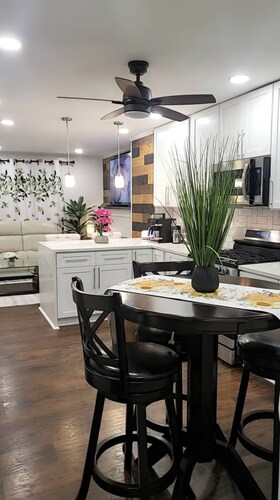 Private upper level 3-bedroom oasis with AC and WiFi. (Host occupies basement)