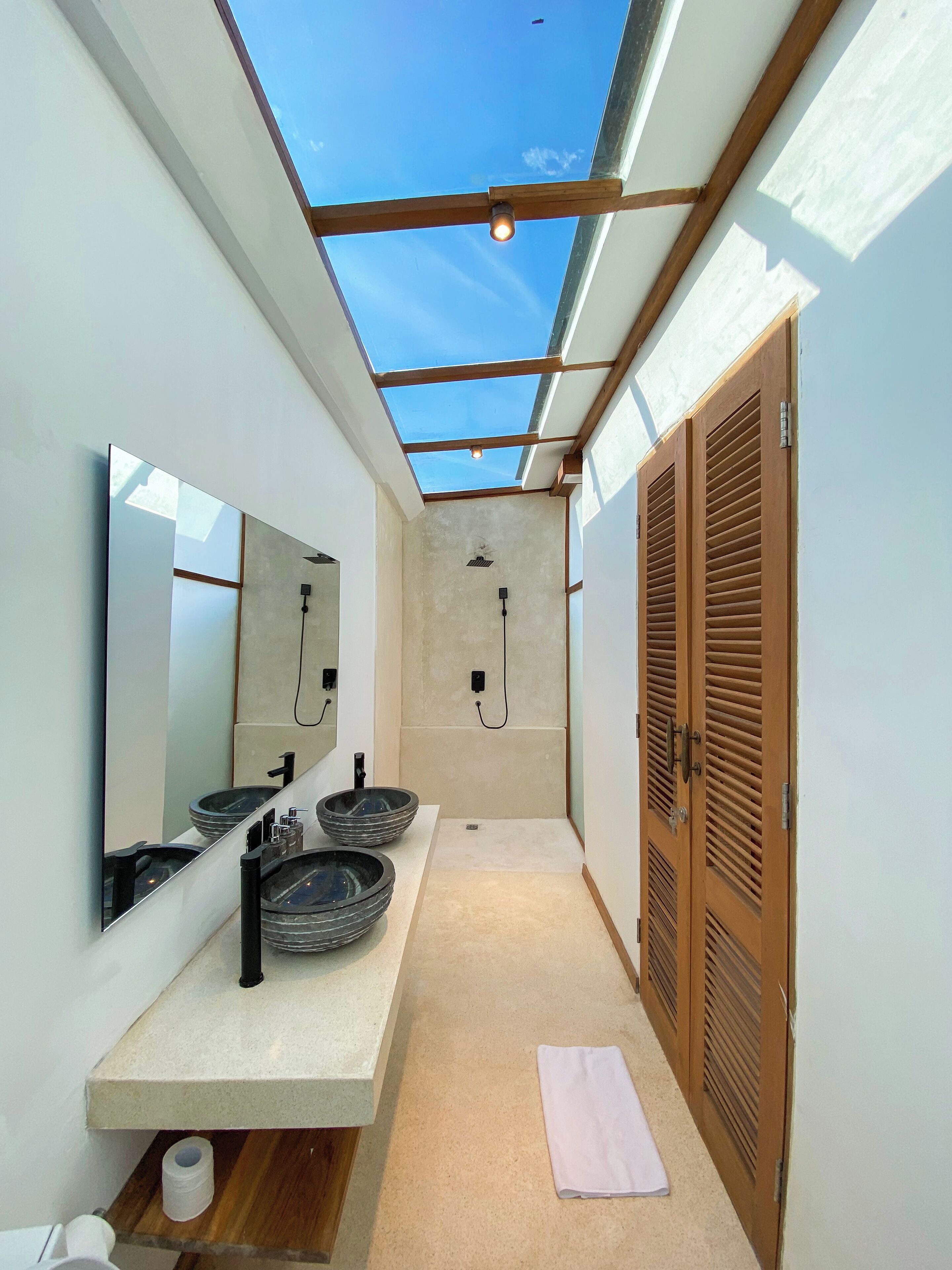 Shower, eco-friendly toiletries, hair dryer, towels