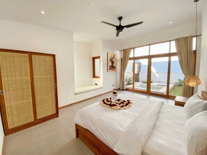 Family House, 2 Bedrooms, Pool View | Minibar, individually decorated, individually furnished, desk