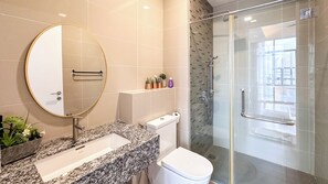 Family Apartment | Bathroom | Shower, hair dryer, towels, soap