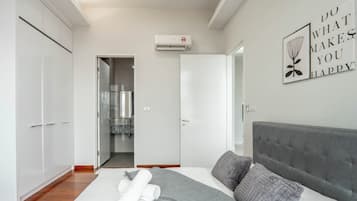 2 bedrooms, blackout curtains, soundproofing, iron/ironing board