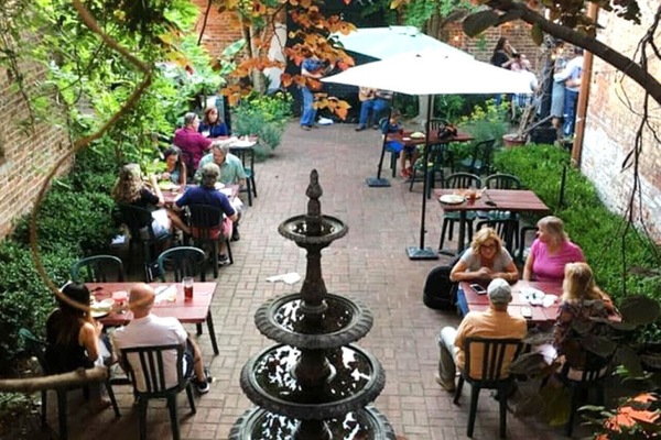 Tramonto Ristorante in Petersburg, VA — where hearty pastas, pizzas, and a cozy courtyard await.