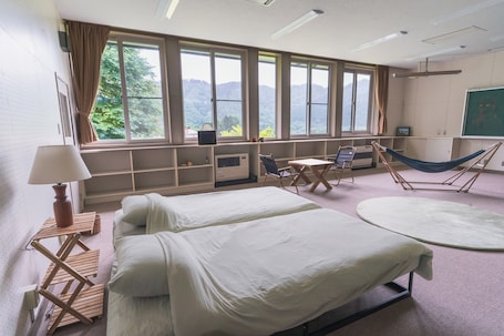 Deluxe Quadruple Room, Mountain View | Individually decorated, individually furnished, desk, laptop workspace
