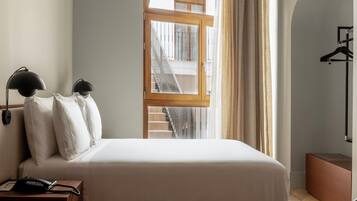 1 dormitorio y ropa de cama de alta calidad