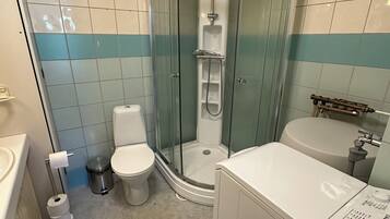 Shower, towels, soap, toilet paper