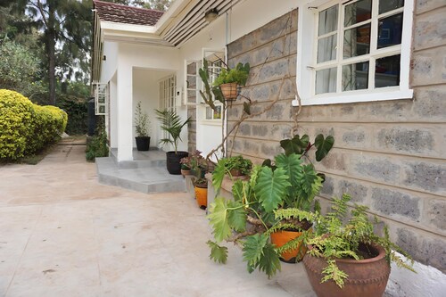 3-bedroom standalone home,spacious garden with daybed,located in Karen, Nairobi.
