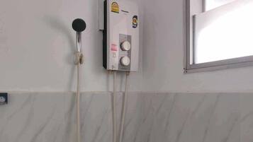 Hair dryer, towels, soap, shampoo