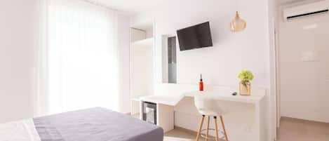 Habitación Deluxe, balcón | Cortinas blackout, insonorización y wifi gratis