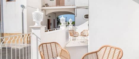 Quarto luxo, sacada | Terraço/pátio