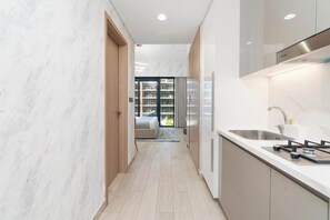 Design Studio, 1 King Bed, Kitchenette, City View | Private kitchen | Coffee/tea maker, electric kettle