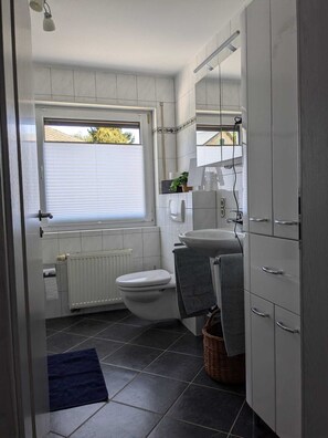 Hair dryer, towels, soap, toilet paper