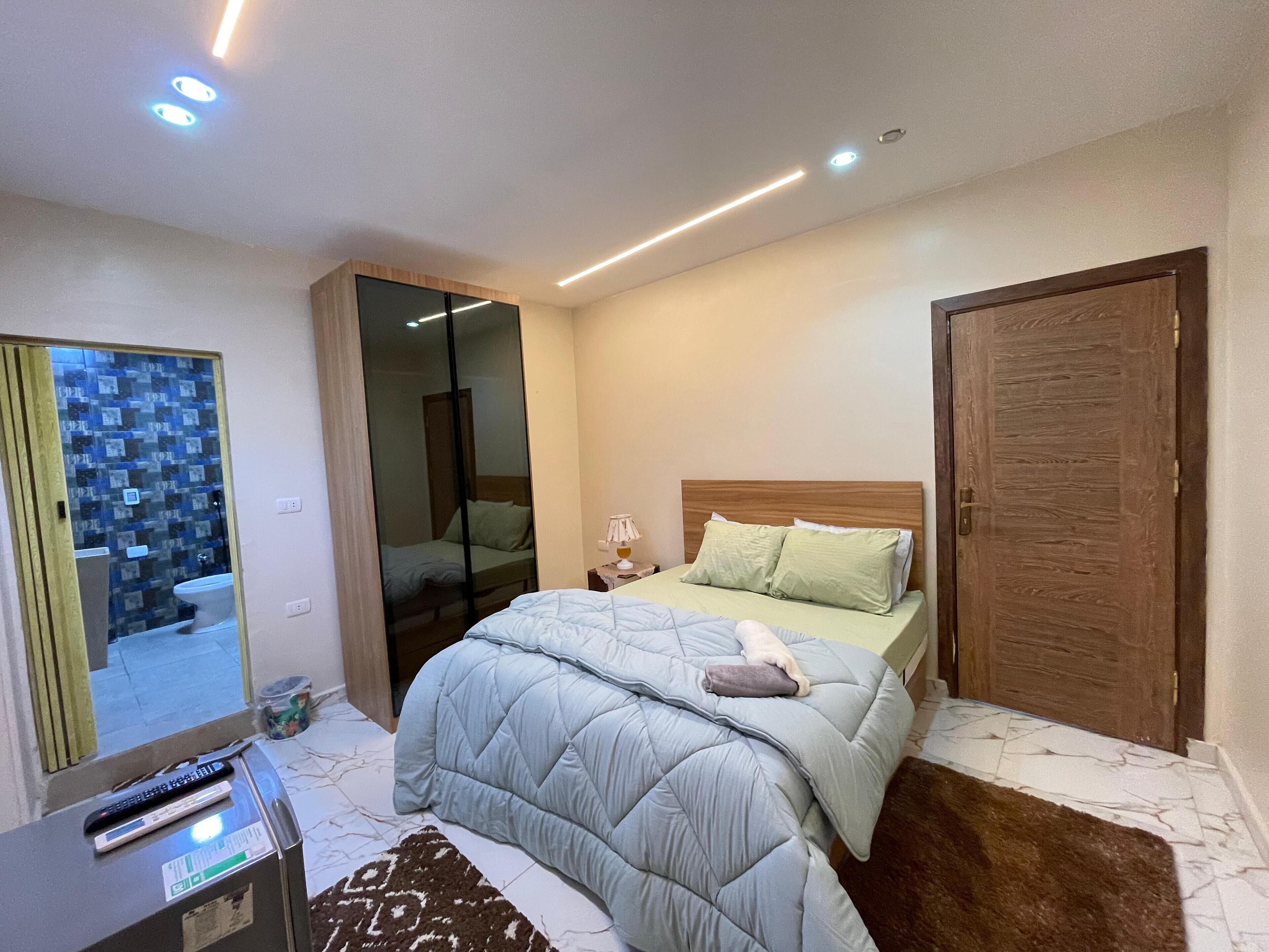 Signature Room | Egyptian cotton sheets, premium bedding, Select Comfort beds