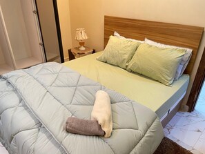 Signature Room | Egyptian cotton sheets, premium bedding, Select Comfort beds