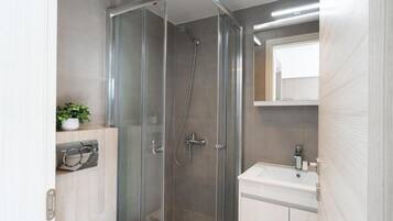 Hair dryer, towels, soap, shampoo