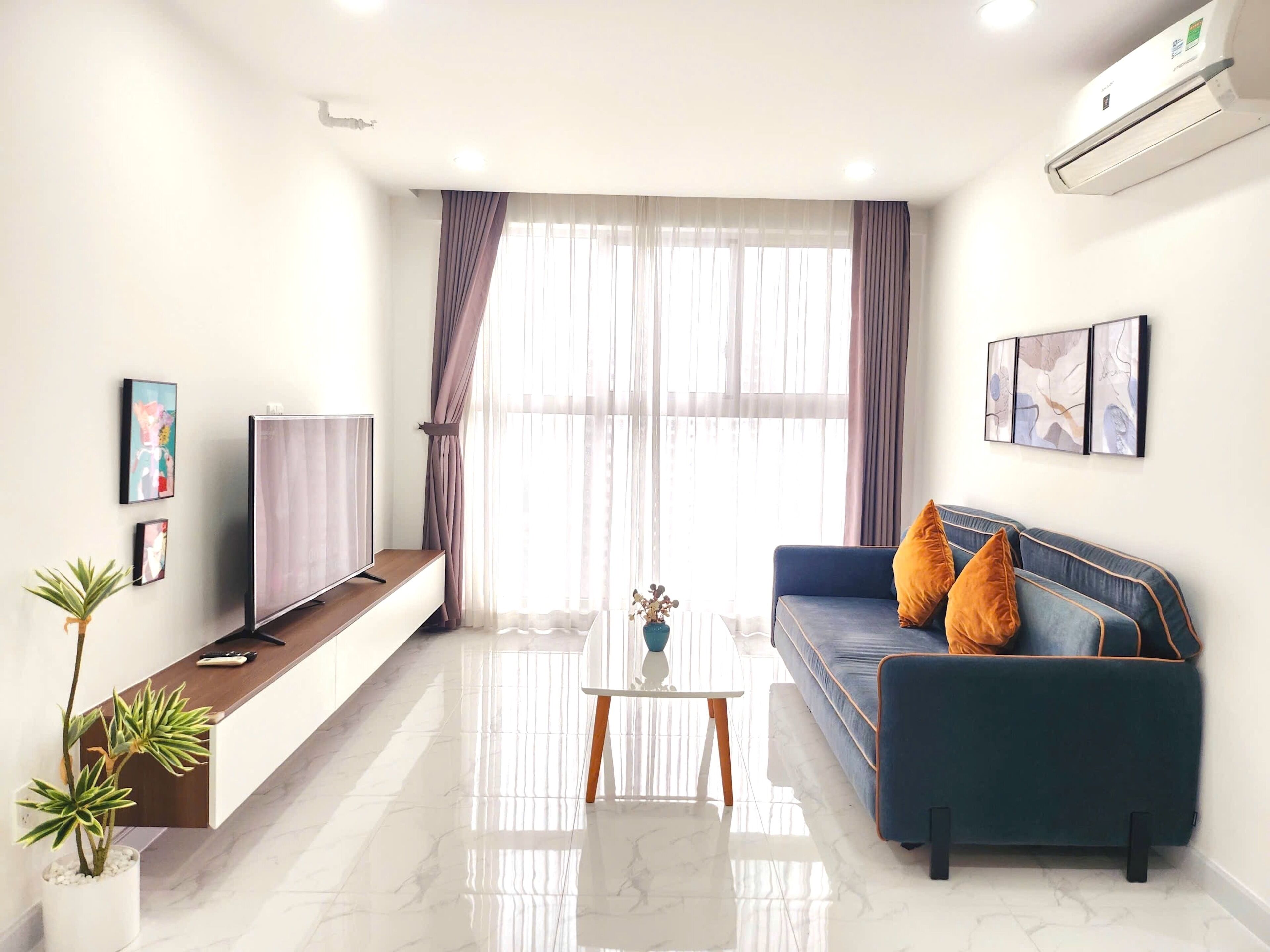 Premier Apartment | Living area | 75-cm Smart TV with digital channels, Netflix, streaming services
