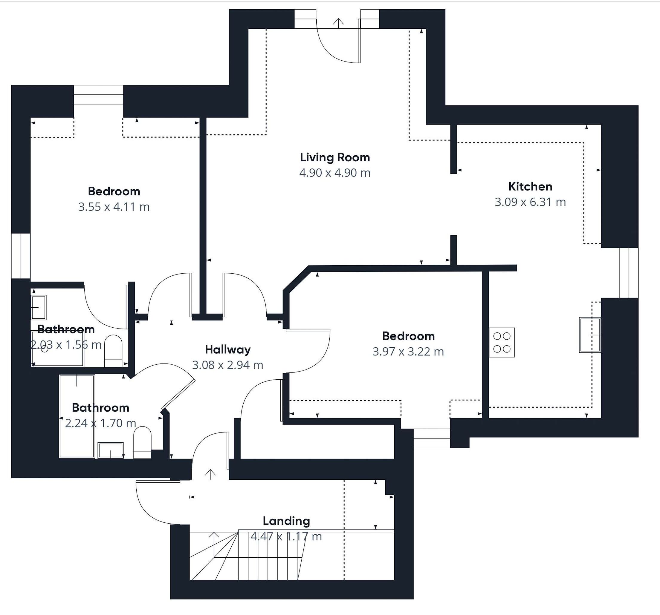 A floor plan of a house with two bedrooms, a living room, a kitchen, two bathrooms, a hallway, and a landing area.