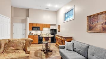 Suite, 1 Bedroom | Living area | Smart TV, streaming services
