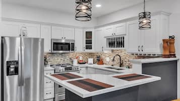 Suite, 1 Bedroom | Private kitchen | Fridge, coffee/tea maker, toaster