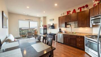 Condo, 2 Bedrooms | Private kitchen | Fridge, oven, coffee/tea maker, toaster