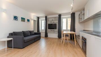 Appartamento Superior, 1 camera da letto, vista città | Pasti in camera