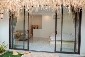 Chambre Deluxe double, balcon, vue sur le jardin | Aire de séjour