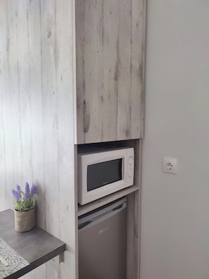 City Apartment, City View | Private kitchen | Full-sized fridge, stovetop, coffee/tea maker, electric kettle - Modiano Studios  Center-Your Urban Stay (Thessaloniki)
