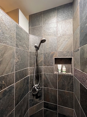 Jetted tub, hair dryer, towels, soap