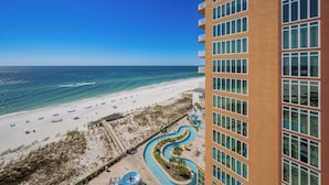 A beachfront hotel with a pool, beach access, and ocean views.