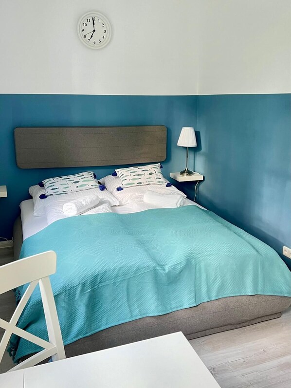 1 bedroom, desk, iron/ironing board, travel cot