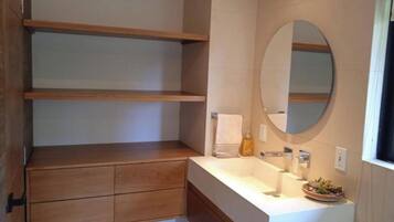 Shower, towels, soap, toilet paper