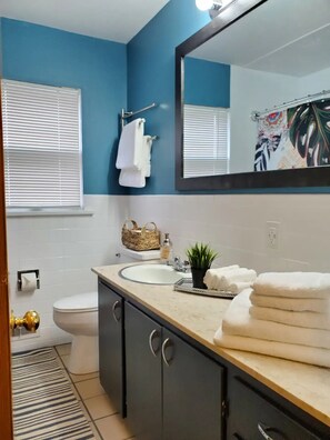 Hair dryer, towels, soap, shampoo