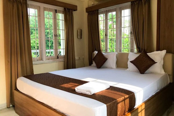 Deluxe Double Room, Balcony, City View | Laptop workspace, blackout curtains, free WiFi