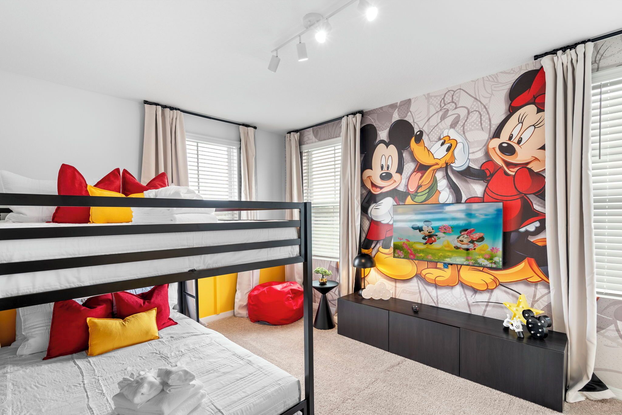 Enjoy the charming decor featuring Disney’s beloved Mickey, Pluto, and Minnie.